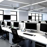 **A modern, paperless office environment. Bright, organized space with employees using computers, collaborating efficiently, and minimal paper in sight. Emphasis on digital displays and a clean, streamlined design.**